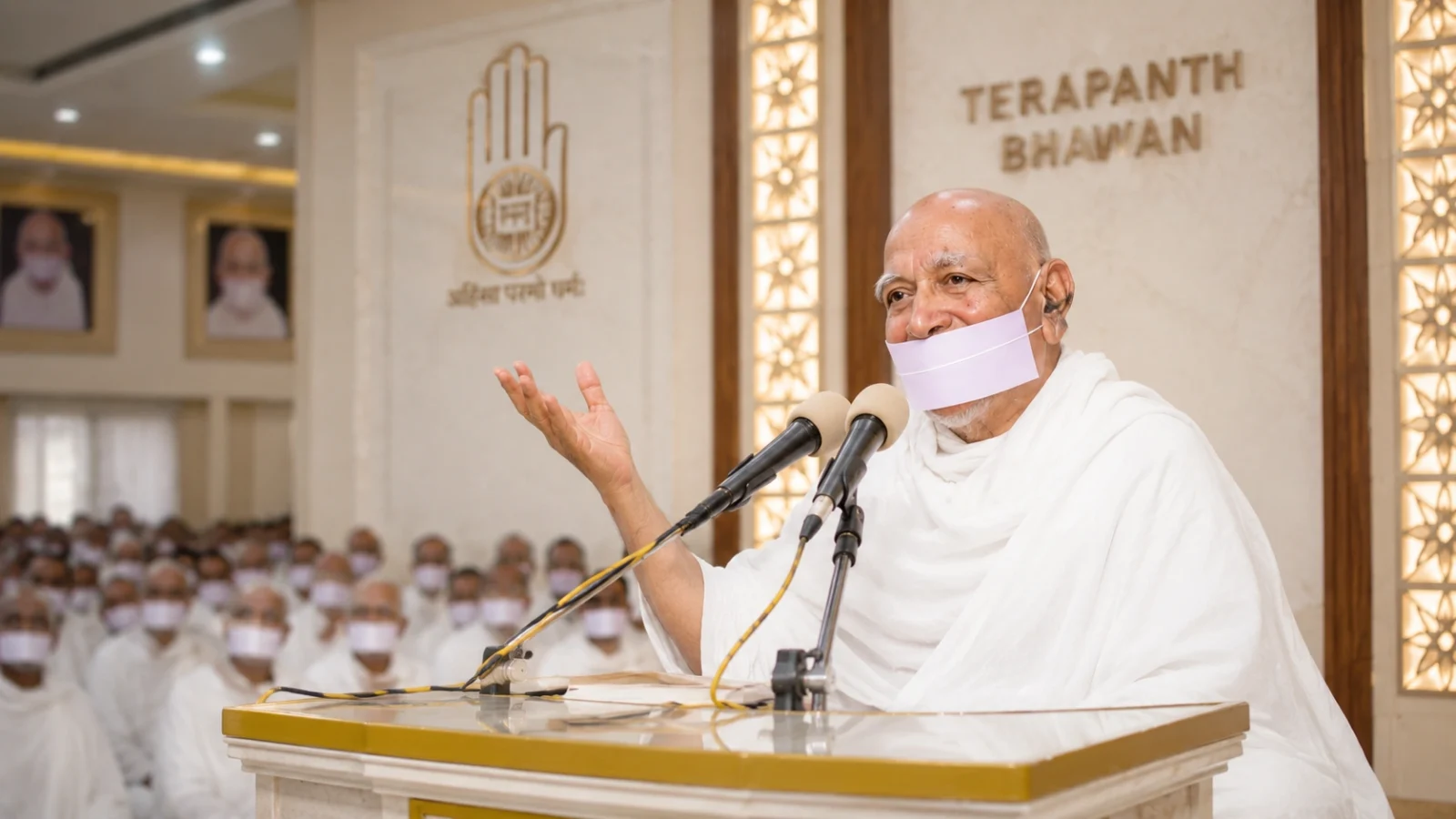 Acharya Tulsi delivering spiritual discourse at Terapanth Bhawan gathering
